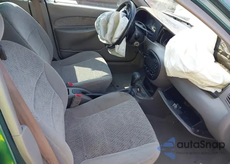 1997 Ford Escort Lx z USA, uszkodzony, nr VIN 1FALP13P4VW258961